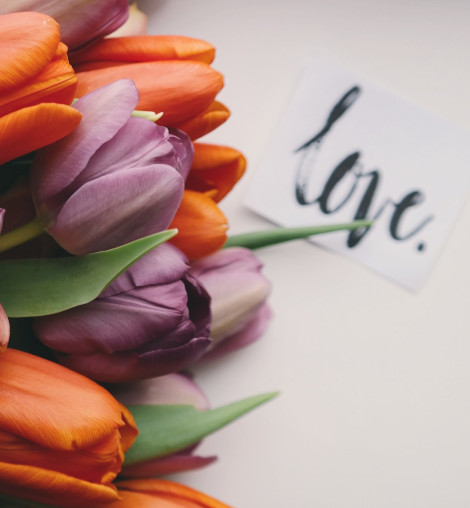 cute flowers and a written 'love' note
